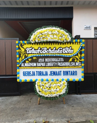 Papan Bunga Duka di Tuan Kentang